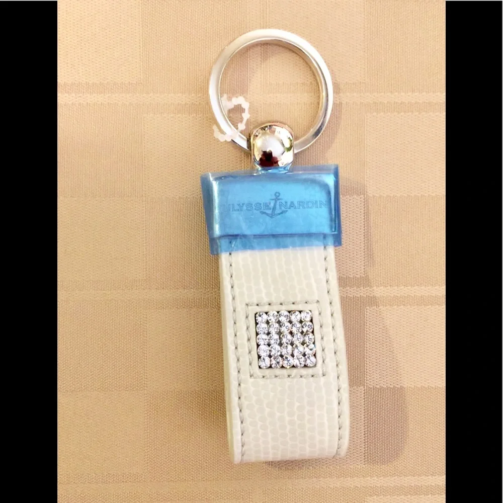 Ulysse Nardin White Leather Key Holder with Blue Accent and Crystal Square